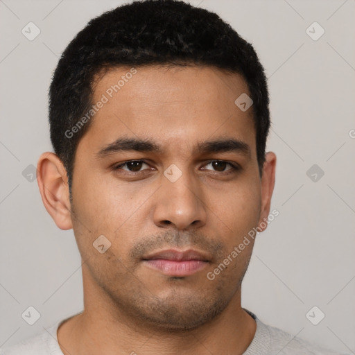 Neutral latino young-adult male with short  black hair and brown eyes