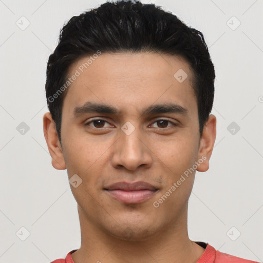 Joyful asian young-adult male with short  black hair and brown eyes