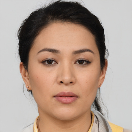 Neutral asian young-adult female with medium  brown hair and brown eyes