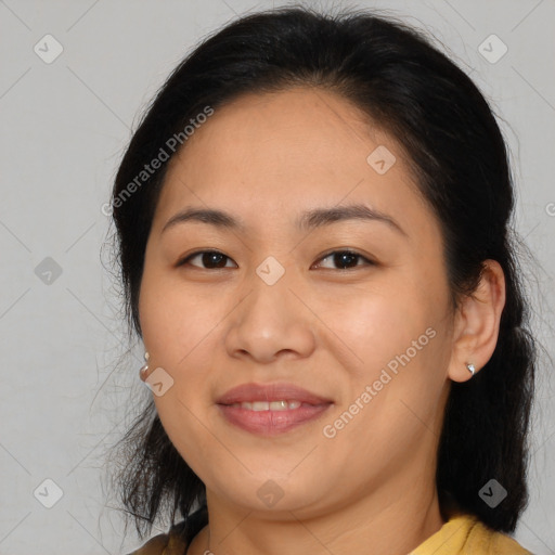 Joyful latino young-adult female with medium  brown hair and brown eyes