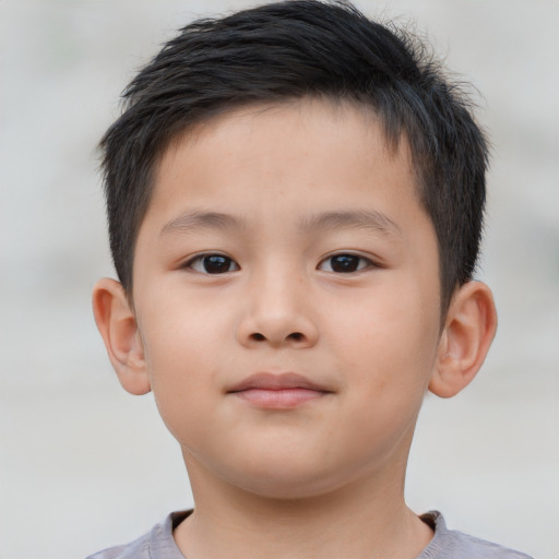 Neutral asian child male with short  brown hair and brown eyes