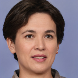 Joyful white adult female with short  brown hair and brown eyes