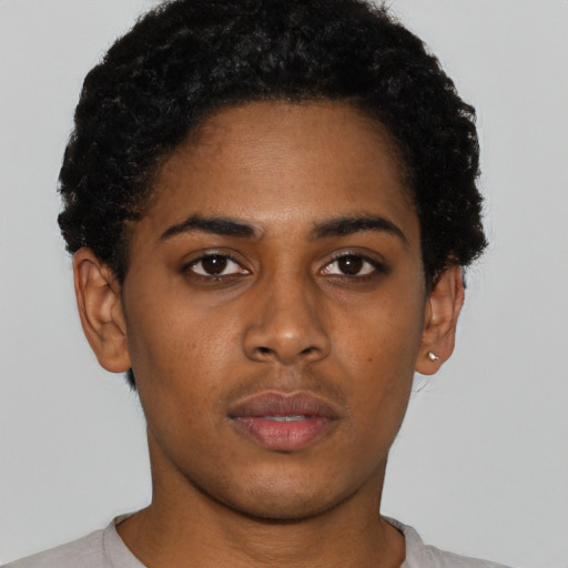 Neutral black young-adult female with short  black hair and brown eyes