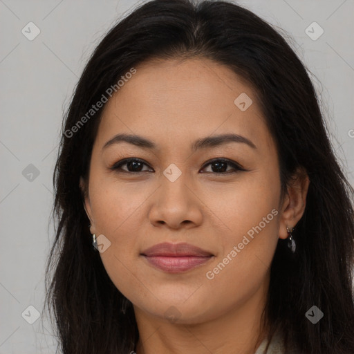 Joyful asian young-adult female with long  brown hair and brown eyes