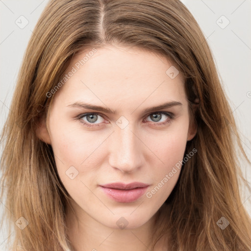 Neutral white young-adult female with long  brown hair and brown eyes