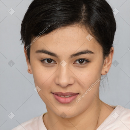 Joyful asian young-adult female with short  brown hair and brown eyes