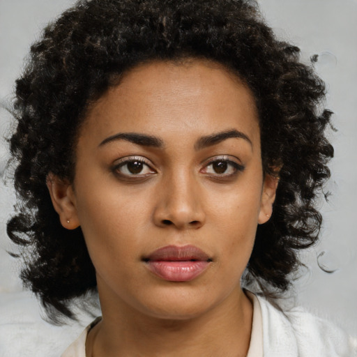 Neutral latino young-adult female with medium  brown hair and brown eyes