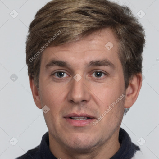 Joyful white adult male with short  brown hair and grey eyes