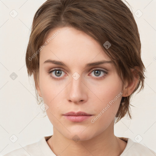 Neutral white young-adult female with medium  brown hair and grey eyes