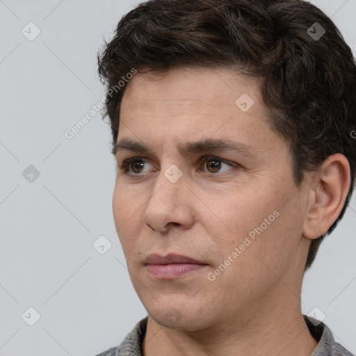 Neutral white adult male with short  brown hair and brown eyes