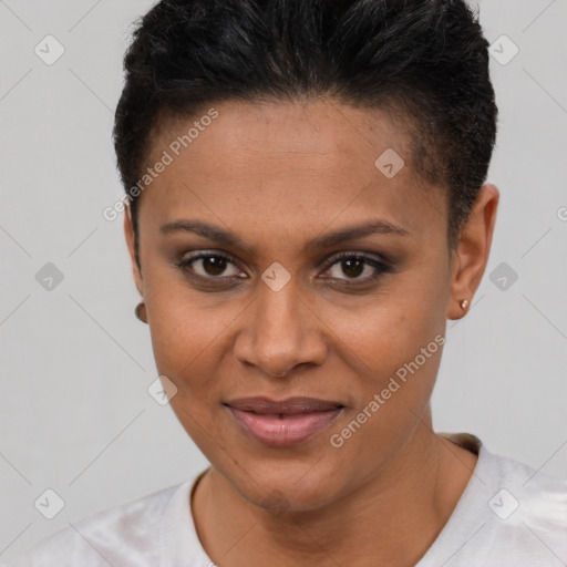 Joyful latino young-adult female with short  black hair and brown eyes