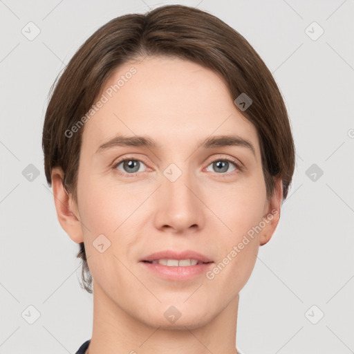 Joyful white young-adult female with short  brown hair and grey eyes