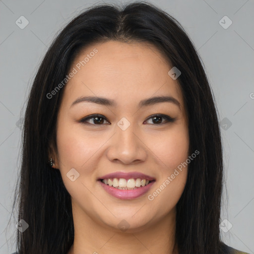 Joyful asian young-adult female with long  brown hair and brown eyes