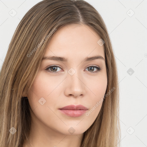 Neutral white young-adult female with long  brown hair and brown eyes