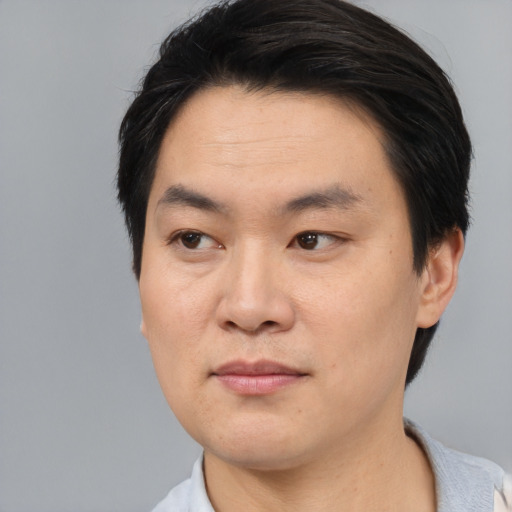 Neutral asian young-adult male with short  black hair and brown eyes