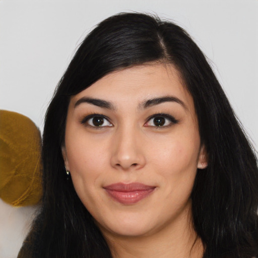 Joyful asian young-adult female with long  black hair and brown eyes