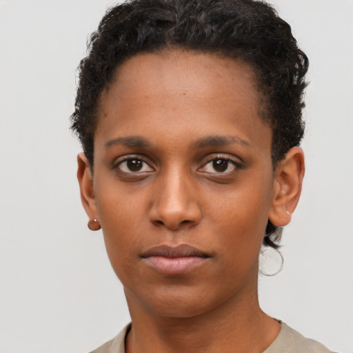 Neutral black young-adult female with short  brown hair and brown eyes