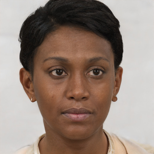 Neutral black young-adult female with short  brown hair and brown eyes