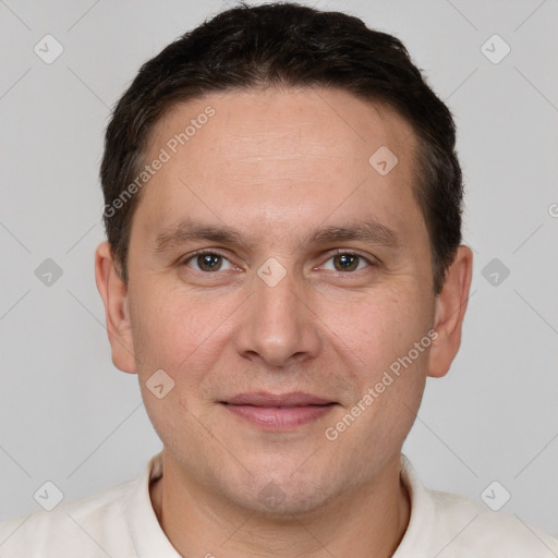 Joyful white adult male with short  brown hair and brown eyes