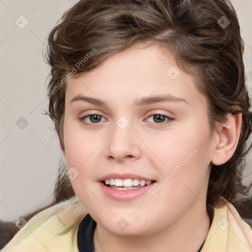 Joyful white child female with medium  brown hair and brown eyes