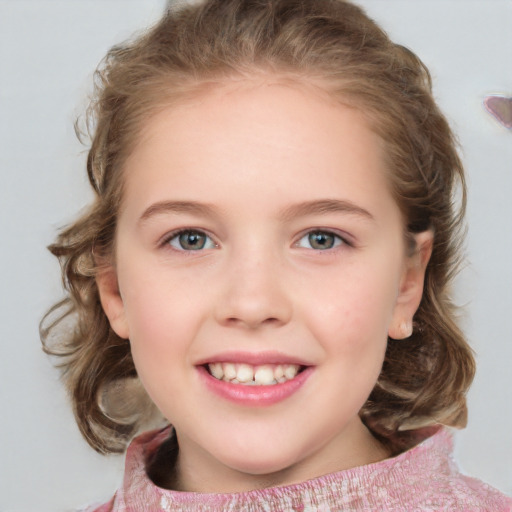 Joyful white child female with medium  brown hair and blue eyes