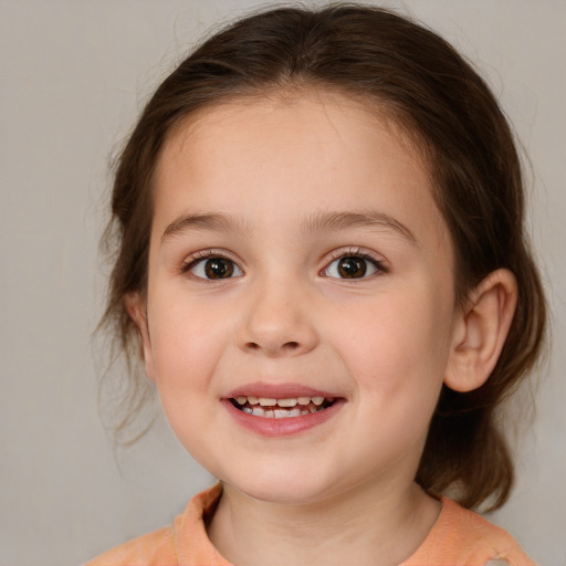 Joyful white child female with medium  brown hair and brown eyes