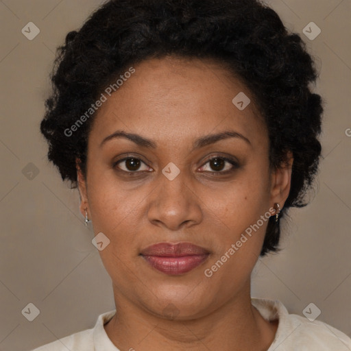 Joyful latino adult female with short  brown hair and brown eyes
