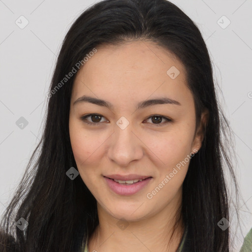 Joyful asian young-adult female with long  brown hair and brown eyes