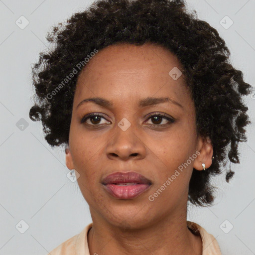 Neutral black adult female with short  brown hair and brown eyes