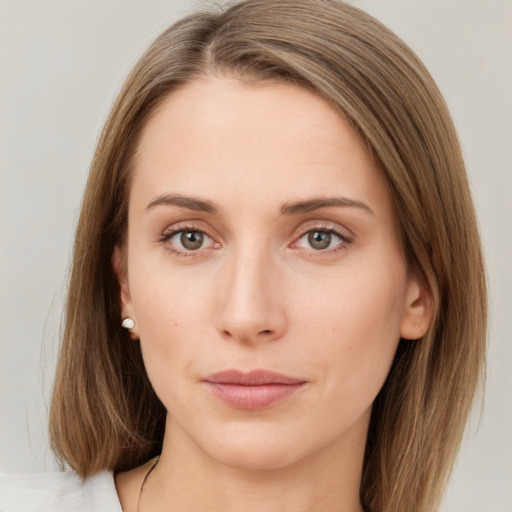 Neutral white young-adult female with medium  brown hair and green eyes