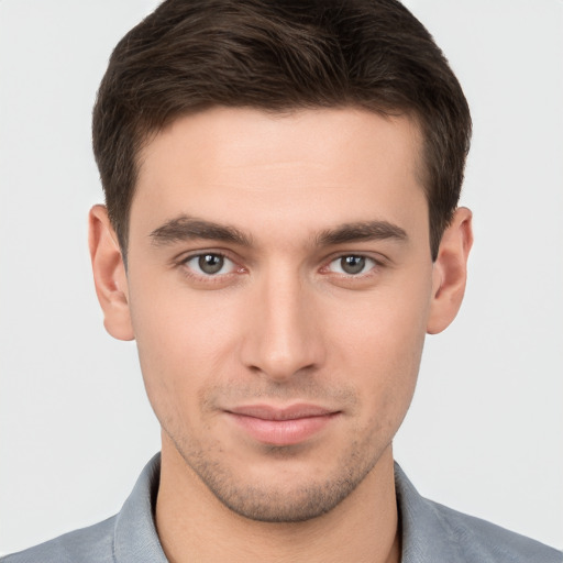 Neutral white young-adult male with short  brown hair and brown eyes