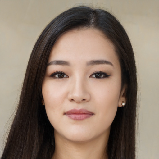 Neutral asian young-adult female with long  brown hair and brown eyes