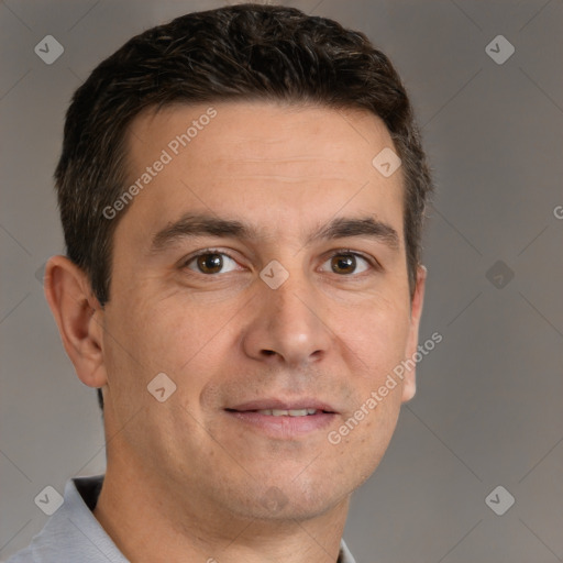 Joyful white adult male with short  brown hair and brown eyes