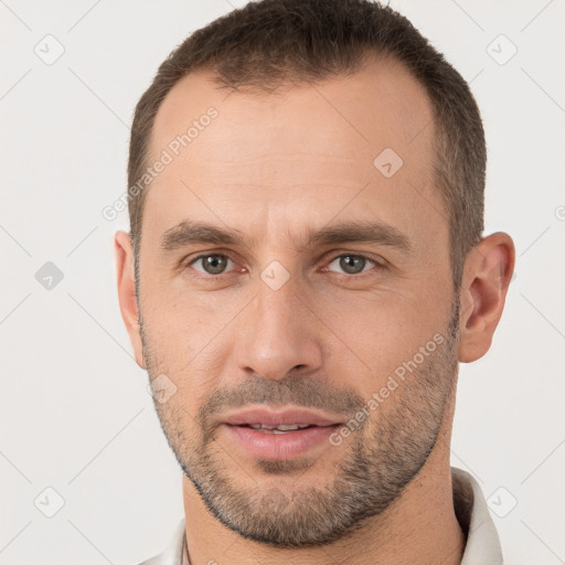 Neutral white young-adult male with short  brown hair and brown eyes