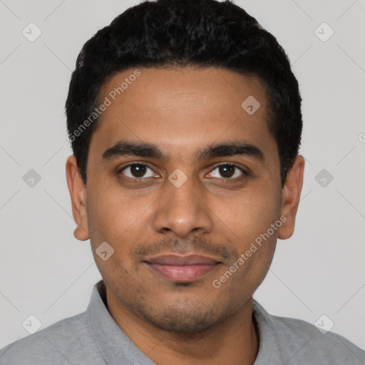 Joyful latino young-adult male with short  black hair and brown eyes
