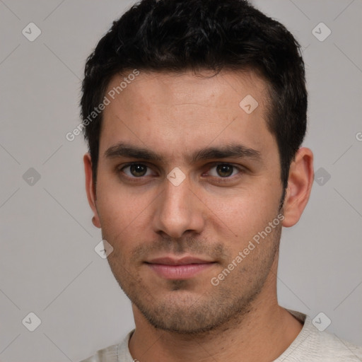 Neutral white young-adult male with short  black hair and brown eyes