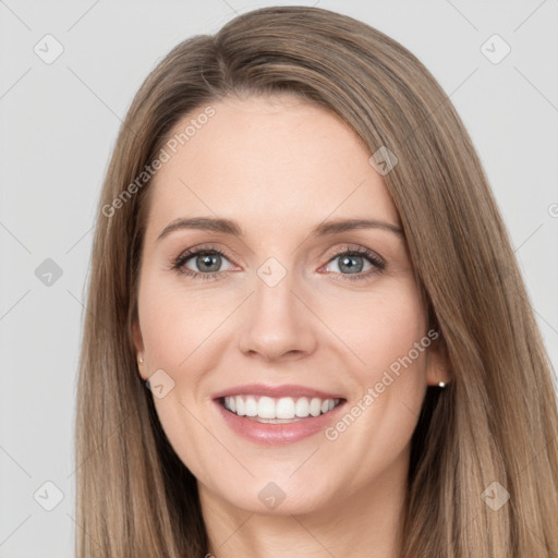 Joyful white young-adult female with long  brown hair and grey eyes