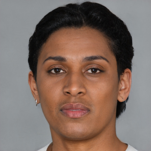 Neutral latino young-adult female with short  black hair and brown eyes