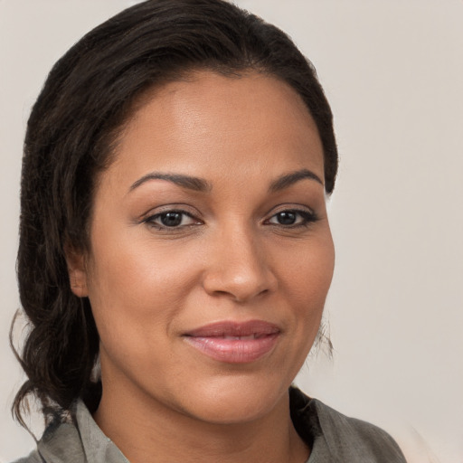 Joyful white young-adult female with medium  brown hair and brown eyes