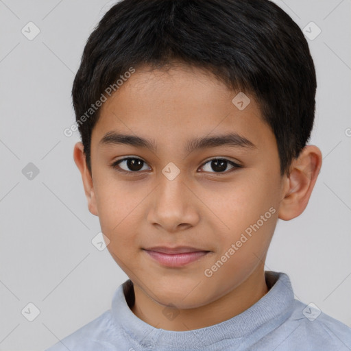 Joyful asian child male with short  brown hair and brown eyes