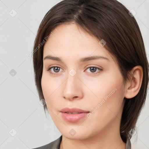 Neutral white young-adult female with medium  brown hair and brown eyes