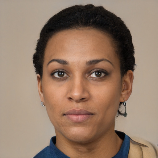 Neutral latino young-adult female with short  black hair and brown eyes