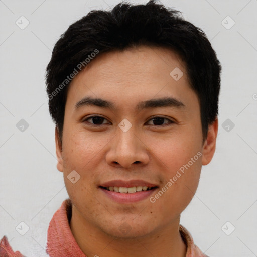 Joyful asian young-adult male with short  brown hair and brown eyes