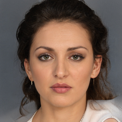 Neutral white young-adult female with medium  brown hair and brown eyes