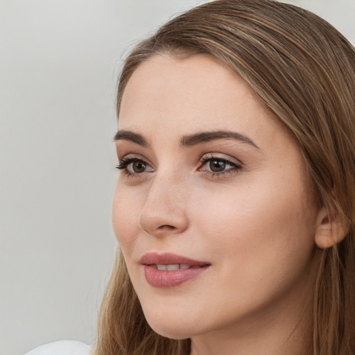 Neutral white young-adult female with long  brown hair and brown eyes