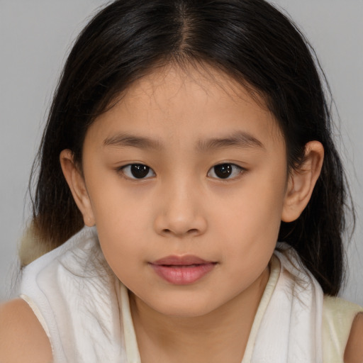 Neutral asian child female with medium  brown hair and brown eyes