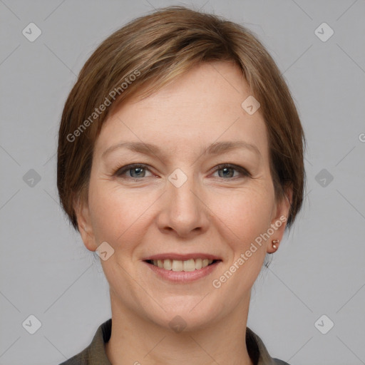 Joyful white adult female with medium  brown hair and grey eyes