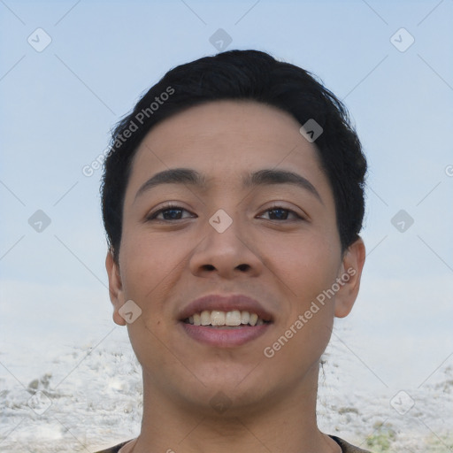 Joyful asian young-adult male with short  black hair and brown eyes