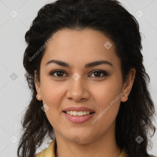 Joyful latino young-adult female with long  brown hair and brown eyes