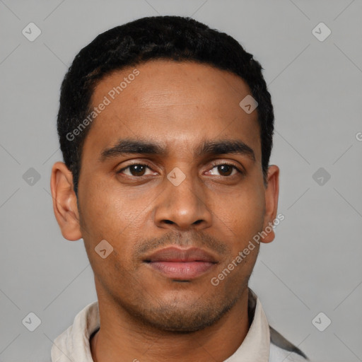 Neutral latino young-adult male with short  black hair and brown eyes